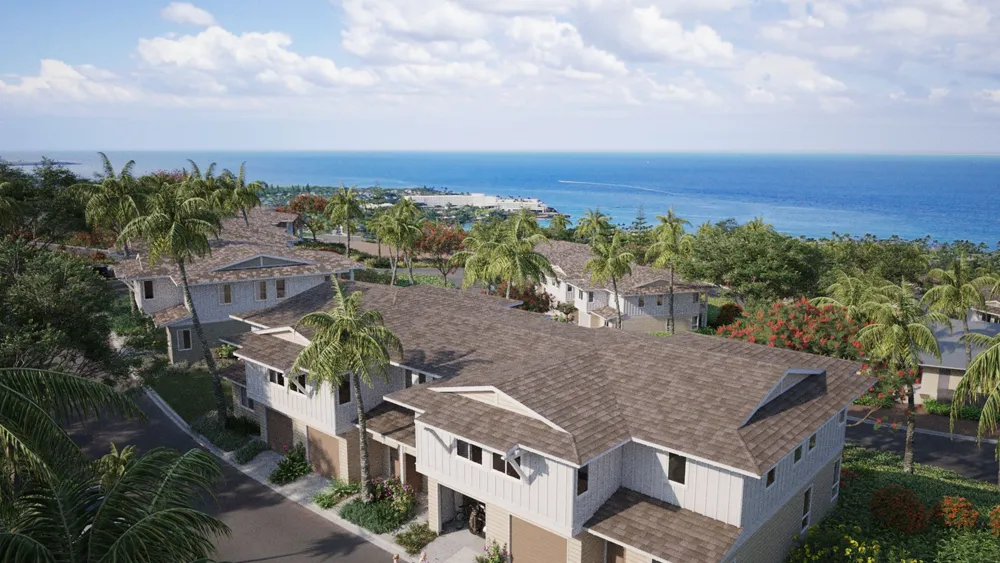 Kainini townhomes overhead view with a view of the ocean.