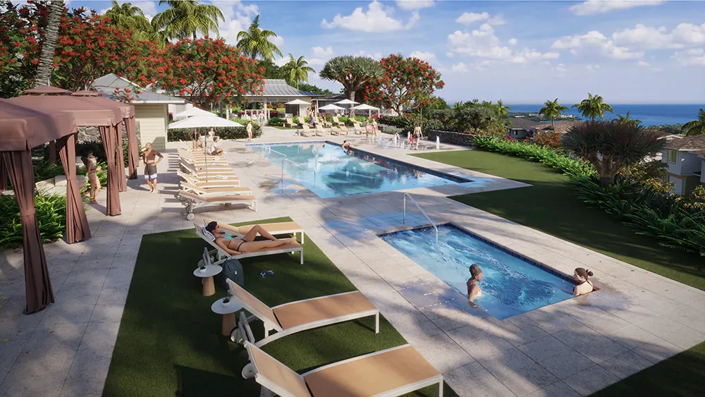 View of people lounging by a pool with a view of the ocean.