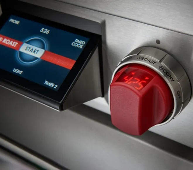 Wolf Oven control panel with touchscreen start button and red temperature knob set to 425°F