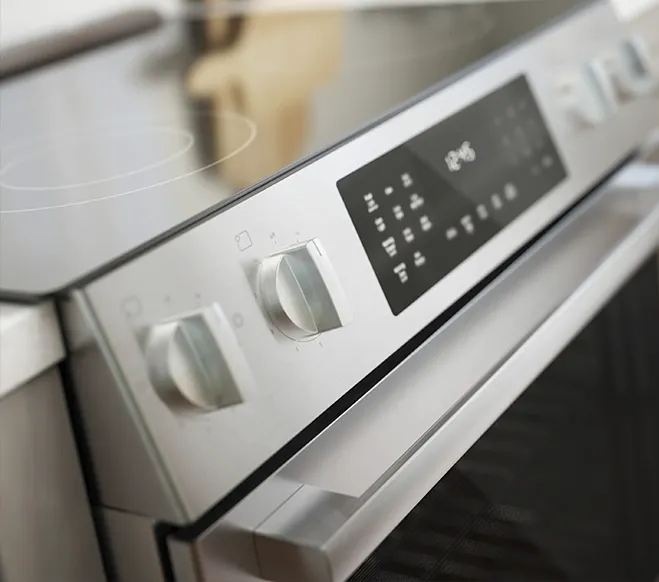 Stainless steel Bosch oven control panel with knobs and digital display